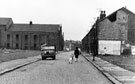 View: s19818 Rear of Attercliffe Pavilion and housing awaiting demolition from Nos. 38, 40, 42 etc. (right), Swan Street, Atterclffe looking towards housing on Coleridge Road