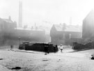 Sutherland Road at the junction with Clun Street looking towards the Gents Urinal on the corner of Gower Street, Burngreave with Cammel Laird and Co. Ltd. in the background