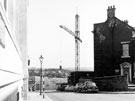 View: s19843 Surrey Street looking towards Arundel Street during the construction of the College of Technology, 1961-1962. Leader House, right
