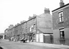 Nos. 12 - 42 Sylvester Street from Jessop Street, showing back to back housing and entrance to Court No 2 (next to lamp post). No 12, Sylvester Street, Albion Inn, right