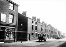 Nos. 20 - 42 Sylvester Street showing derelict back to back housing, looking towards junction with Davenport Lane and entrance to Court No 6, left (at lamp post), No 44, Horace Hogarth, Herbalist (tobacconists)