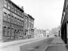 Thomas Street looking towards derelict premises on Bath Street and Springfield School. Premises on left include No. 54 Brunswick Hotel and Southern and Richardson Ltd., cutlery manufacturers, Don Cutlery Works