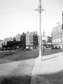 View: s19991 Town Hall Square and rockery from Fargate, 1930-1937, looking towards Pinstone Street and Barkers Pool. Premises include Town Hall Chambers, left and Wilson Peck, Music Shop, right