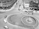 Town Hall Square and Goodwin Fountain, looking towards Fargate and Leopold Street, premises include Wilson Peck, No 70, Fargate, H.L. Brown and Son Ltd., jewellers, No. 68 Cantors, No. 66 Dean and Dawson Ltd., travel agents and Bank Chambers
