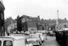 View: s20035 Tudor Way, Nos 1-21, in background including No 13, Adelphi Hotel and No 21, House Refuse Collection and Disposal Department, premises on right front Sycamore Street