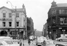 Tudor Way looking towards Sycamore Street, from Tudor Street. No. 13 Adelphi Hotel, left, No. 21 House Refuse Collection and Disposal Department, right