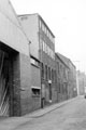 View: s20046 Union Lane showing side view of Nos. 60 - 64 Charles Street, Foxon and Robinson Ltd., packing case manufacturers and rear of Nos. 29 and 31 Union Street, left