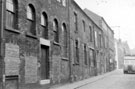 View: s20047 Union Lane showing side view of Nos. 60 - 64 Charles Street, Foxon and Robinson Ltd., packing case manufacturers