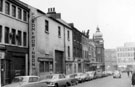 View: s20054 Union Street looking towards junction with Furnival Street. Premises (left) include Foxon and Robinson Ltd., packing case manufacturers, P.W. Lacey Ltd, footwear and outfitters, former Newton Chambers, Tudor House, formerly Newton House in background