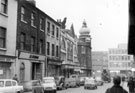 Union Street looking towards junction with Furnival Street. Premises on left include No. 29 J.L. McAdam, No 33, Lea Fabrics, The Palace, P.W. Lacey Ltd., footwear and outfitters, former Newton Chambers, Tudor House, formerly Newton House, background
