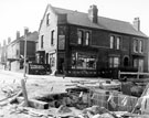 Subway construction work for Tinsley roundabout at the junction of Town Street (left) and Newburn Road, showing H. Shaw, greengrocer, No. 2 Town Street/52 Newburn Road, Nos. 50 and 48, Newburn Road (right) and 4, 6, etc., Town Street