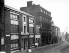 Tudor Way, formerly Arundel Street, prior to demolition, left-right, Surrey House, former School of Art and Design and No 71, Talbot Hotel