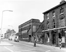 Upper Hanover Street from Glossop Road junction, premises on right include No. 55 Thomas Robinson, Sons and Co. Ltd., butter and egg merchants, No. 57 Yorkshire Telephone Systems Ltd. (former Reuben Thompson Coach Offices)