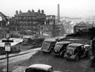 Vicar Lane looking towards junction with Lee Croft, Campo Lane. Hawley Street and Flats, left. Chimney in background belongs to Tramway and Omnibus Depot