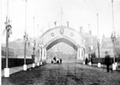 Decorative arch for the royal visit of Prince and Princess of Wales (later King Edward VII and Queen Alexandra), Victoria Station Road looking towards Exchange Street