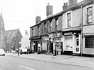 View: s20296 Washington Road, Sharrow. Cemetery Road and Congregational Church in background, premises include No 13, Washington Road Post Office, No. 15, D.A. Turnell, grocers, No. 17 J.E. James, tobacconist, No. 19 A. Egginton, optician