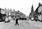 View: s20297 Washington Road looking towards Cemetery Road Congregational Church and Summerfield Street, No 8, H. Blenkinsop, Grocers, left