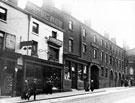 Waingate looking towards Exchange Street, Lenton and Rusby, opticians, No. 8 Waingate (left), Royal Hotel (right), 1913-1914