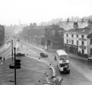 View: s20344 Traffic negotiating the roundabout, West Bar looking towards Paradise Street showing No. 85 P.J. Wilkinson, printer, Moseley's Arms public house and The Don Palace