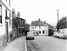 Well Road looking towards junction with Oak Street, from outside No.106 Ye Olde Shakespeare Inn, Well Road and (background) No. 83 Sportsman Inn