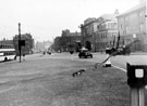 Traffic negotiating the roundabout West Bar showing Nos. 81/83 Moseleys Arms public house (right) and  Don Picture Palace