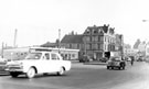 View: s20387 West Bar looking towards Hicks Lane and Coulston Street, showing Nos. 64/84, Portland Autos and No. 60 Jackie Newman, domestic equipment