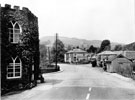Ashopton village, Sheffield to Glossop road, demolished in the 1940's to make way for construction of Ladybower Reservoir. Toll Bar Cottage, foreground. Ashopton Inn and garage in background