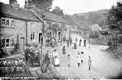 Entire population of Derwent village showing Derwent Post Office, centre