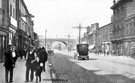 Streetscene on The Wicker looking towards the Wicker Arches showing Nos. 29 - 31 B. Wood, pawnbroker (left) and Samuel Osborn and Co. Ltd., Clyde Steel Works