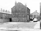 Nos. 8 and 9, Wigan Place, Carbrook looking towards Carbrook C. of E. School, with rear of housing on Carbrook Street (left) Nos. 8 and 9, Wigan Place, Carbrook looking towards Carbrook C. of E. School, with rear of housing on Carbrook Street (left)