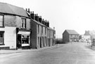 Nos. 183, A. Asher and Son, butcher, 185, 187 etc. and 205, W. Ambler, motor engineer etc., Wincobank Avenue looking towards the junction with Shiregreen Lane