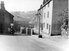 View: s20654 Nos. 17, 15 13 etc. (right) and gable end of No. 14 Wincobank Lane looking towards the former Picturedrome, Upwell Street