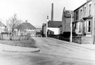 Nos. 84 - 88, 90 and 92 looking towards Nos. 13 and 15 Wincobank Road with the chimney of Sheffield Brick Co. Ltd. on Shiregreen Lane in the backgrounde