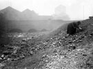 Coal picking, Windsor Street from the confluence of the Royds Milll Tail Goit and River Don with Effingham Steel Works and Rolling Mills in the background