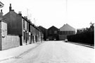 Woodbine Road looking towards Sanderson Brothers and Newbould Ltd and Stevenson Road and Scrap metal merchant (left)