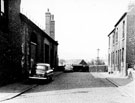 Nos. 6 - 10 (right to left) and Newhall Steel Works (left), Zion Place from Burgess Road looking towards Attercliffe Cemetery
