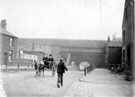 View: s20781 Worksop Road looking towards the Pheasant Inn (before the bridges, right), railway arch and aqueduct
