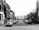 Hallcar Street from Earsham Street looking towards Carlisle Street showing Albion Hotel, Earsham Street (extreme left), No. 36 - 38 J. Heath and Sons, funeral directors and Guards Rest public house, No. 41 Sorby Street