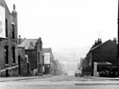 View: s20848 Harleston Street from Petre Street looking towards Edgar Street (left) and Carlisle Street, showing No. 7, grocer and off - license