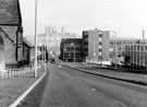 St. Ann's C. of E. Church and church hall (left) and Kenwood Motor Services Ltd., British Iron and Steel Research Association training and laboratories (right), Hoyle Street from Bethel Street looking towards (back) Woodside and Pyebank Flats  