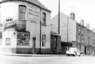 View: s21198 Little London Road from Chesterfield Road. No. 2, Chesterfield Road, Garnett Bros. Ltd., wine and spirit merchants. Back to back houses leading to Court Nos 1 and 3 in background