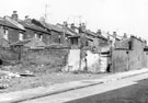 Rear of terraced housing on Nottingham Street, showing demolished site of properties Nos. 23 and 25 Lopham Street, Burngreave