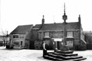 Woodhouse Market Cross and stocks, looking towards Cross Daggers Inn, No. 14, Market Square, Woodhouse Woodhouse Market Cross and stocks, looking towards Cross Daggers Inn, No. 14, Market Square, Woodhouse