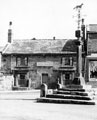 Woodhouse Market Cross, stocks and Cross Daggers Inn, No. 14 Market Square, Woodhouse