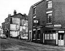 View: s21619 Guards Rest public house, No. 41 Sorby Street, at junction of Hallcar Street, known locally as the Widow's Hut. Nos. 36 - 38 J. Heath and Sons, funeral directors in background