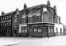 Derelict Brunswick Hotel, No. 54 Thomas Street at junction of Egerton Street, (closed 1964). Premises on left include Southern and Richardson Ltd., cutlery manufacturers, Don Cutlery Works