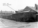 Carbrook Church of England School at the junction of Carbrook Street and Albert Street showing derelict housing on Dunlop Street in the background awaiting demolition