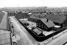 Elevated view of Carbrook Church of England School at the junction of Carbrook Street and Albert Street showing housing on Dunlop Street etc. and surrounding area Elevated view of Carbrook Church of England School at the junction of Carbrook Street and Albert Street showing housing on Dunlop Street etc. and surrounding area