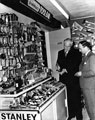 A customer chooses one of the tools he wants for the job from a shop display of Stanley Tools, produced in Sheffield by Stanley Tools Ltd.