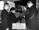 View: s22590 Princess Margaret is introduced to Miss Sarah Carrington who had worked at Spear and Jackson Ltd., for 66 years, at the 'Sheffield in its Mettle' exhibition, Cutlers' Hall
